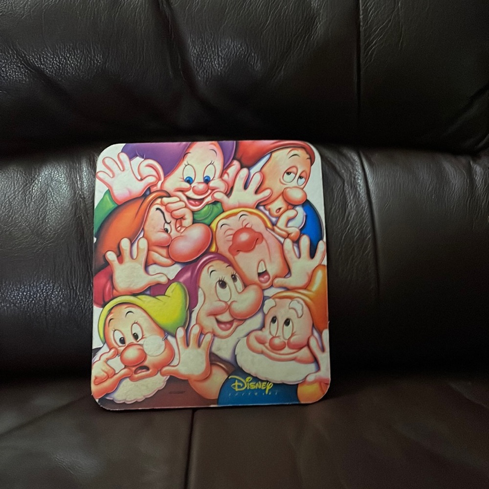 1990’s Disney mousepad. The Seven dwarfs.